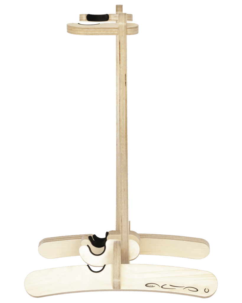 Beautiful clear varnished birchwood curved surfboard rack in the shape of the tail of a surfboard, with hooks to hold the rails and tail and two slightly curved feet connected perpendicular to the upright curved arms. Image is taken from the side of the rack. Transparent background.